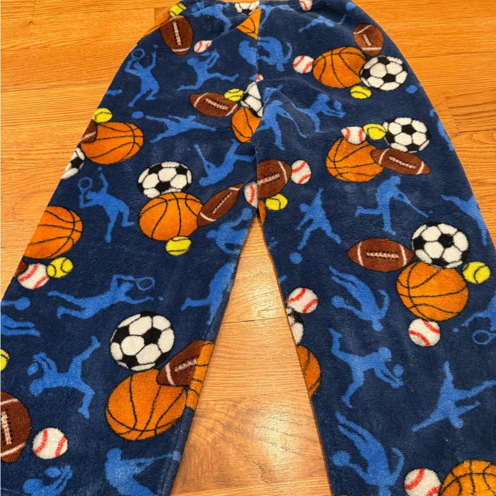 Made With Love and Kisses sport Themed Pajama Pants. Kids size 7-8.